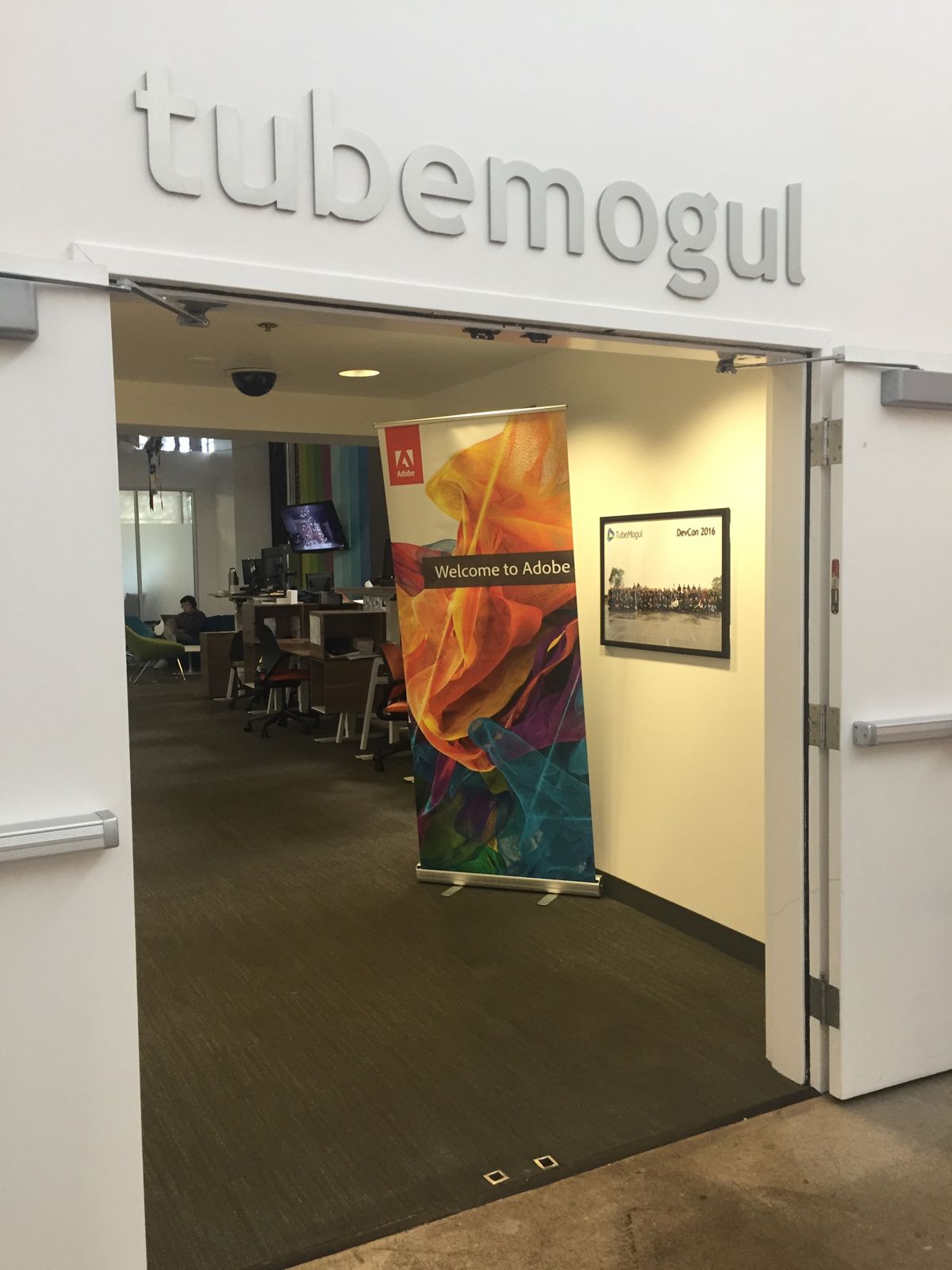 TubeMogul office door with a Welcome to Adobe banner